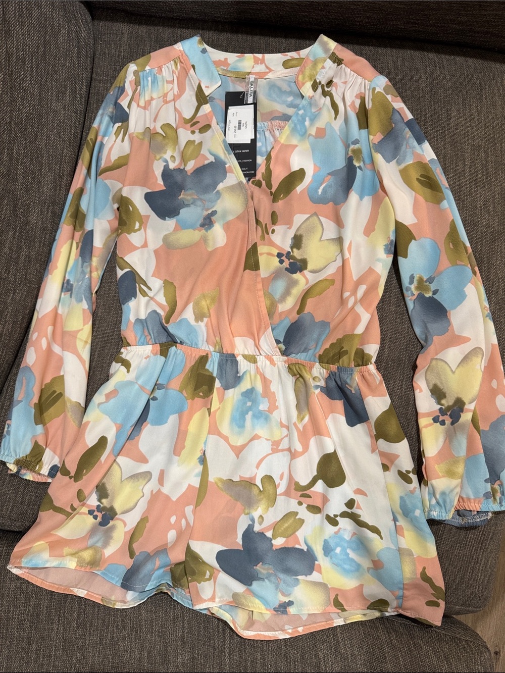 Floral Peplum Long-Sleeve Romper in Peach Multi